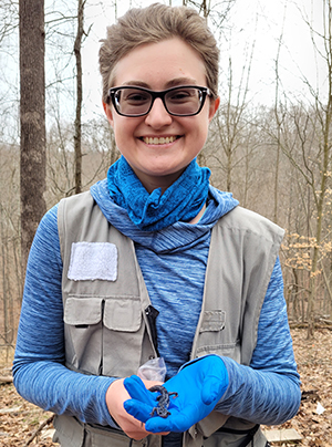 Alison holding a slimy salamander