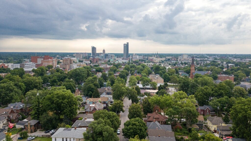 Aerial view of a city. Photographer: Zach Vessels – Source: Unsplash