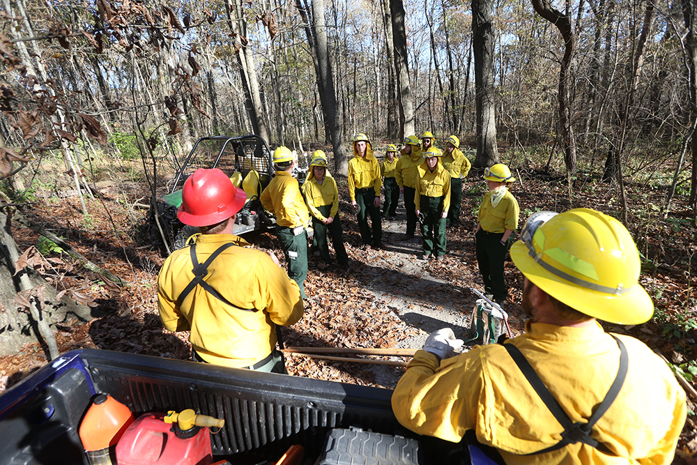 Control burn students getting instructions
